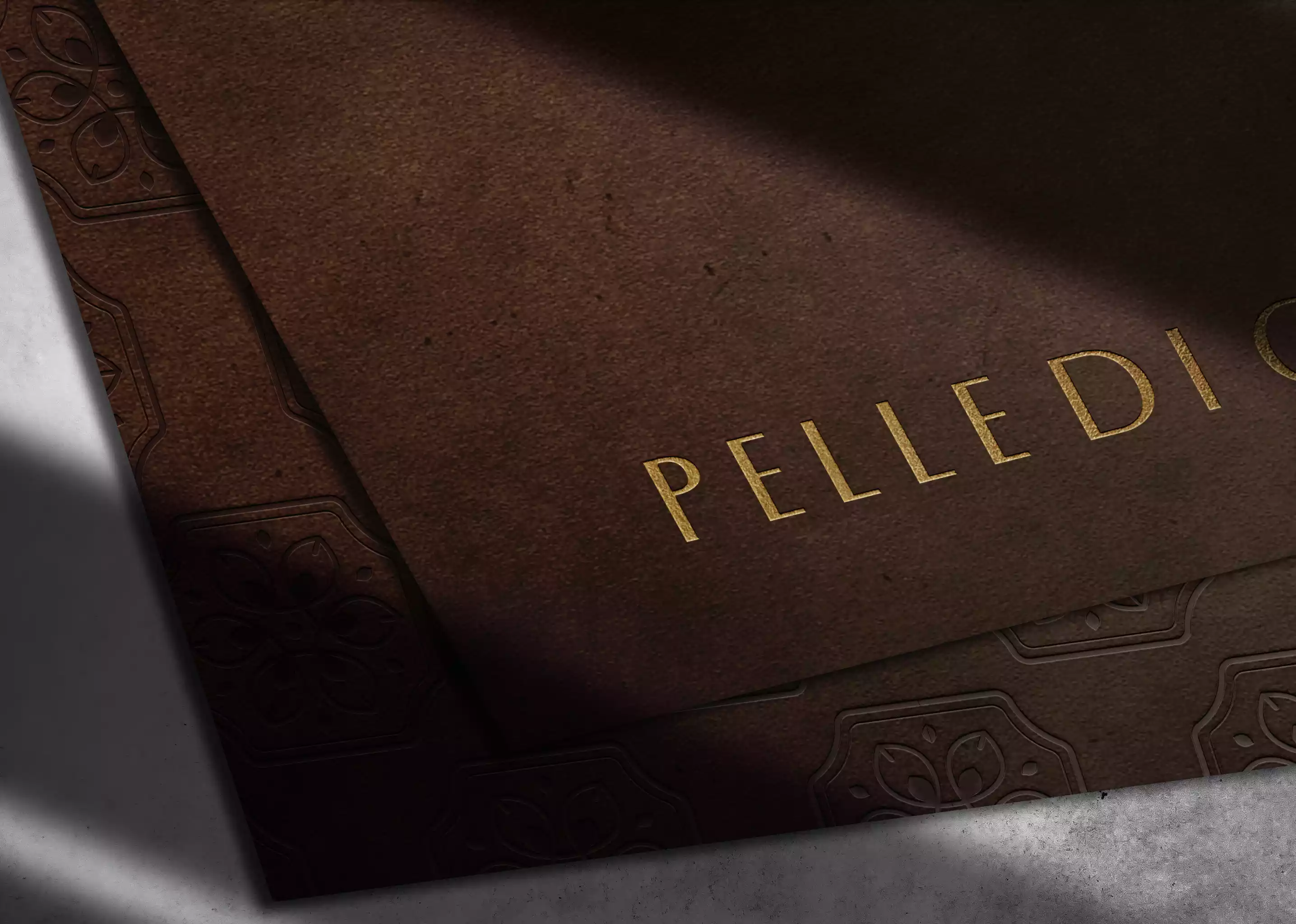 luxury_close_up_leather_embossed_logo_paper_mockup_prespective_view